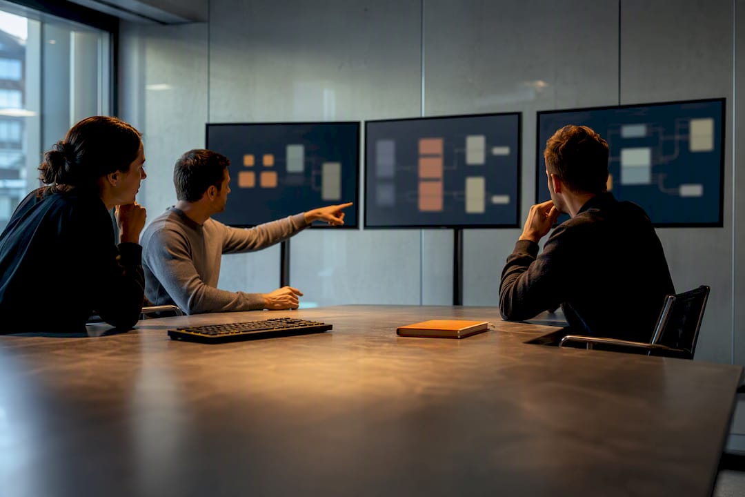 Engineers reviewing isolated agent runs